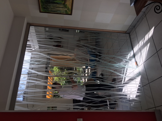 Porte en verre coulissante sur mesure